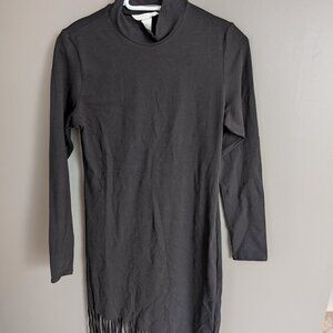 Black Jersey H&M dress with fringe on the bottom NWOT